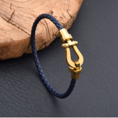 Leather cord bracelet with stainless steel horseshoe buckle, blue with gold, 21 cm