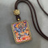 Tibetan Mahakala six-armed protective amulet pendant
