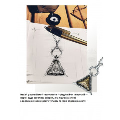 Eye of the Mountain pendant in a triangular metal frame
