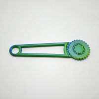 Hand tool for punching holes in cardboard boxes, green