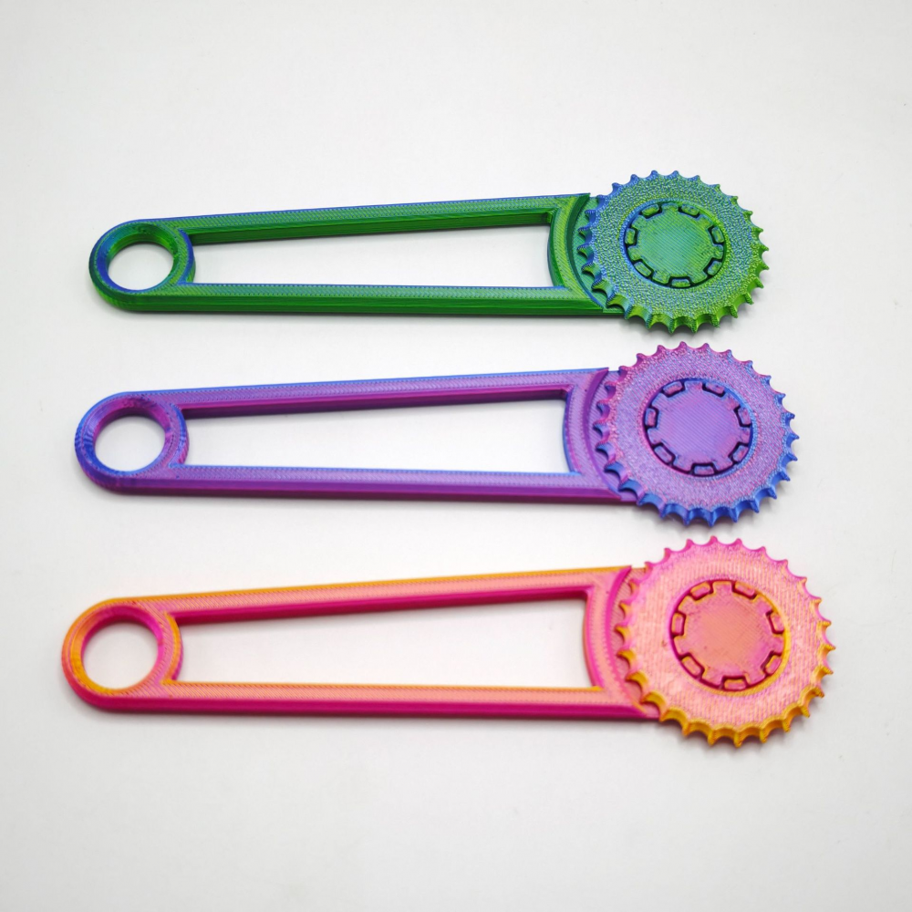 Hand tool for punching holes in cardboard boxes, green