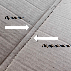 Hand tool for punching holes in cardboard boxes, green