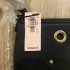 Women's mini bag with chain Victoria's Secret V-Quilt Studded Grommet, black with metal rings, 25x18 cm