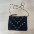 Women's mini bag with chain Victoria's Secret V-Quilt Studded Grommet, black with metal rings, 25x18 cm