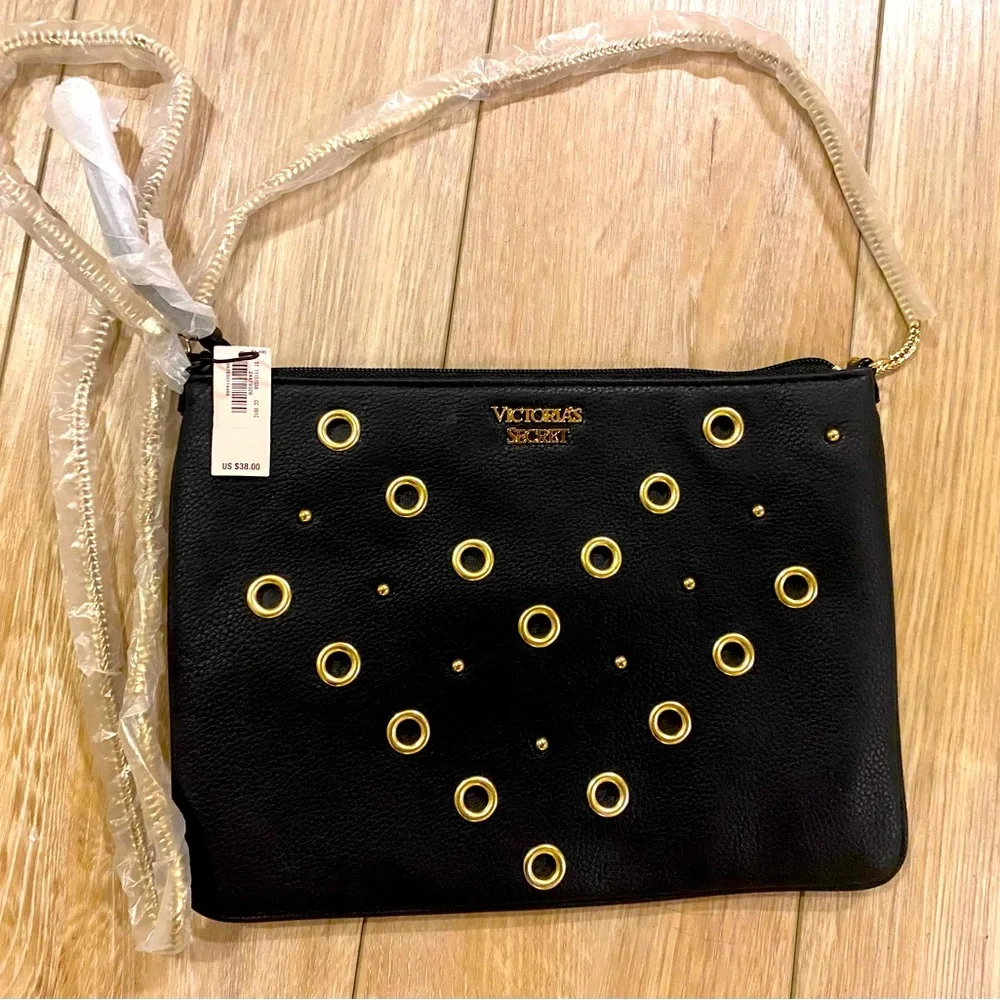 Women's mini bag with chain Victoria's Secret V-Quilt Studded Grommet, black with metal rings, 25x18 cm