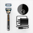 Gillette Labs heated razor with 1 handle, 2 cartridges, and a charging device.