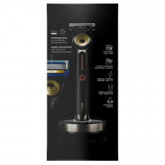 Gillette Labs heated razor with 1 handle, 2 cartridges, and a charging device.