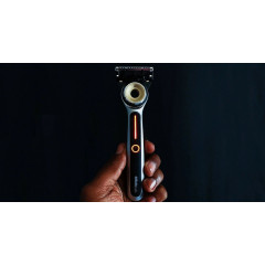 Gillette Labs heated razor with 1 handle, 2 cartridges, and a charging device.