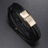 Braided unisex black leather and gold hardware bracelet