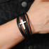 Braided unisex black leather and silver hardware bracelet