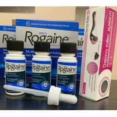 Rogaine Extra Strength men's hair growth product with minoxidil derma-roller